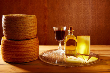 Manchego cheese from Spain in wooden table