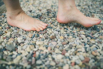 Girl walking on Kneipp foot path