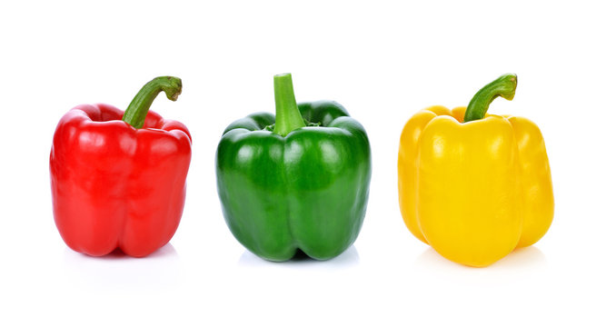 red green yellow pepper on white background