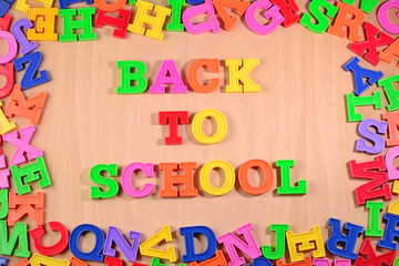 Back to school written by plastic colorful letters