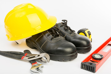 Yellow hard hat and tools