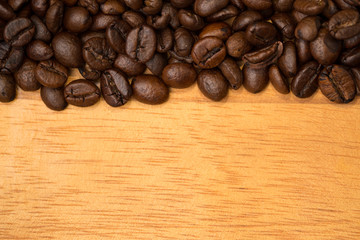 Coffee beans on a wooden table