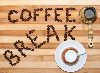 Coffee break writing text on the wooden board
