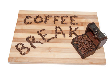 Coffee break text with coffee beans on the wooden board