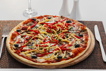 pizza with olives, cheese and pepper