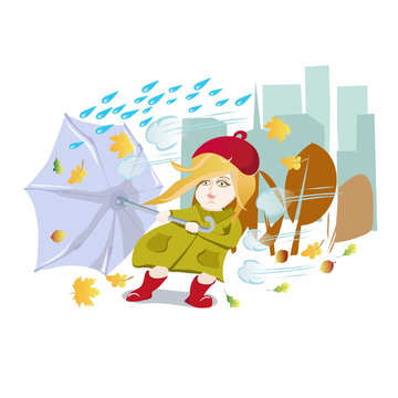 Girl with umbrella in a bad weather comes in the autumn city