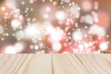 Christmas holiday background with empty wooden over festive boke