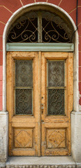 old ragged shabby wooden door