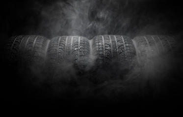 Close-up of car tires with smoke  © Alex Tihonov