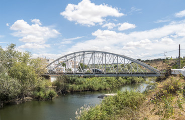 Iron bridge over river
