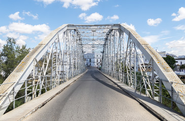 Iron bridge over river
