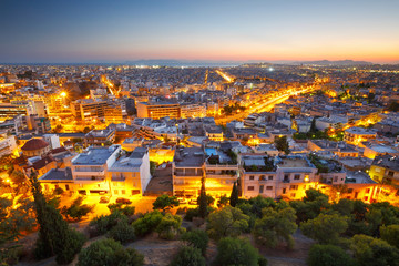 Evening view of Athens from Filopappou hill, Greece.