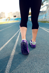 Runner Feet Running on Stadium Closeup