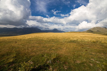 LANDSCAPE OF MOUNTAIN AND CLOUDS GRANSASSO