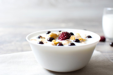 Natural yogurt with fresh berries and cereals
