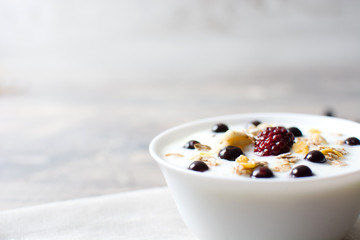 Natural yogurt with fresh berries and cereals