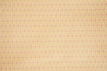 Colorful textile texture with dots pattern closeup