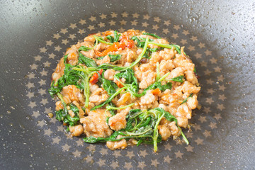 Rice Topped with Stir-Fried Pork and Basil and Chopsticks and Small Cup