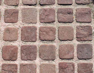 Small brown paves with pink joints