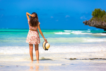 Young woman enjoy a beautiful view in Zanzibar, Tanzania, Africa