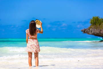 Fototapeta na wymiar Young woman enjoy a beautiful view in Zanzibar, Tanzania, Africa