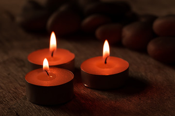 Beautiful Spa composition with aroma candles on wooden . Treatment, aromatherapy