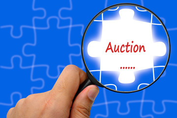 Auction word. Magnifier and puzzles.