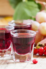 Homemade red wine glasses on the autumn background, selective fo