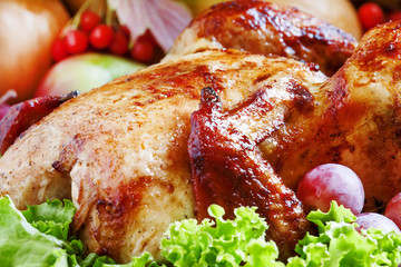 Festive baked chicken with autumn berries, fruits, nuts and vege