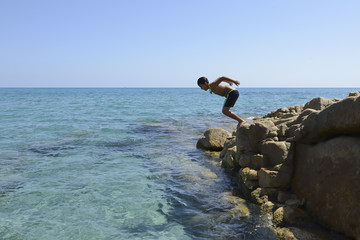 Boy dive into the sea