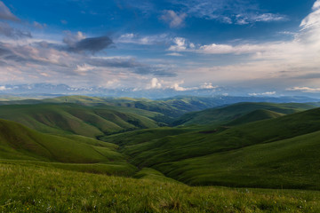 Fototapeta premium Russia, timelapse. The formation and movements of clouds up to the steep slopes of the mountains of Central Caucasus peaks.