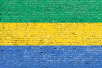 Gabon - National flag on Brick wall