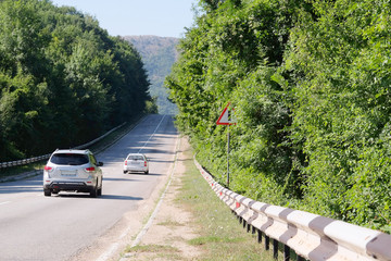 Landscape with the image of a mountain road