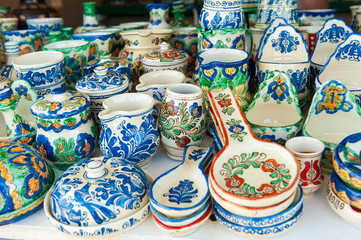 Fototapeta na wymiar Romanian traditional pottery handcrafted mugs at a souvenir shop