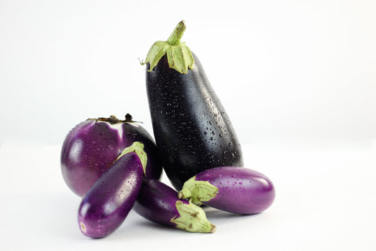 close up eggplants on a white background 