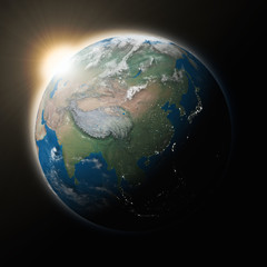 Sun over Southeast Asia on planet Earth