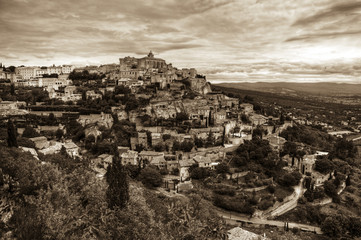 The hilltop town of Gordes, France in sepia