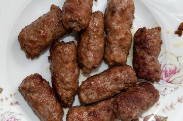 Balkan kebabs with minced meat served in the plate