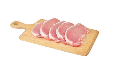 Raw meat steaks on wooden board, isolated on white background