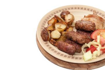 Young potaotes kebabs fried pork tomato salad paprika