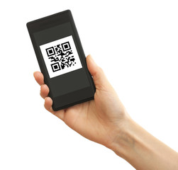 Hand holding smart phone with QR code on screen