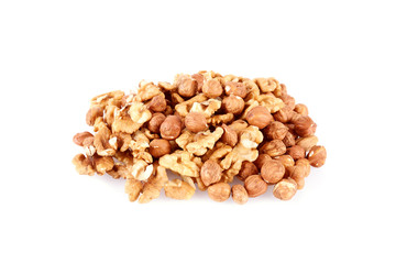 Pile of walnut kerneks and peeled hazelnuts isolated