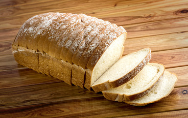 Rustic bread on wooden background