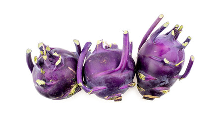 Bunch of purple kohlrabi isolated on a white background