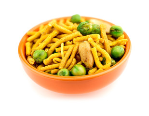 Isolated bowl of Indian bhuja snack on white