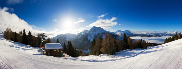 Beautiful 180 degree winter panorama in the Italian alps on a sunny day