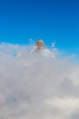 Matterhorn peak above clouds