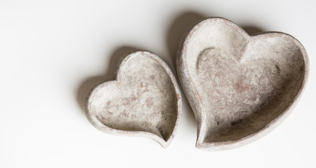 Obraz premium stone bowls in cut shape hearts