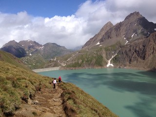 Fototapeta na wymiar Walking through mountains - italian alps