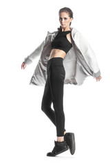 young stylish woman in parka in elegance pose on white © Sergey Chumakov